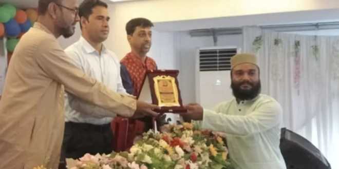সাংবাদিক নোমানীকে সম্মাননা প্রদান